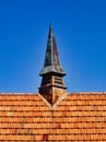 Small Church Spire on Terracotta Tile Roof Royalty Free Stock Photo