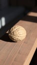Single Brown Walnut on Wood Royalty Free Stock Photo