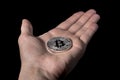 Single BTC Bitcoin coin on hand Royalty Free Stock Photo