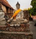 single Buddha statue inside Wat Yai Chai Mongkhon, a Buddhist temple of archaeological park