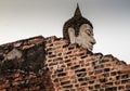 Single Buddha statue inside Wat Yai Chai Mongkhon, a Buddhist temple of archaeological park