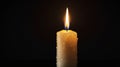 Candle light flame burning wax bright glowing dark background memorial peace remembrance hope 100 Royalty Free Stock Photo
