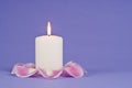 Single Candlelight and Pink Rose Pedals