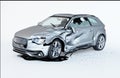 Single car crashed. Silver coupÃÂ© havily damaged on a side Royalty Free Stock Photo