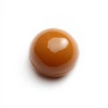 A single caramel candy with a smooth texture, isolated on a white background, showcasing a classic Royalty Free Stock Photo