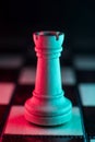Single chess tower. Good or bad side. Red and blue light Royalty Free Stock Photo