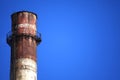 Single chimney top on the winter sky background