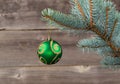 Single Christmas Ornament hanging from Blue Spruce Branch Royalty Free Stock Photo