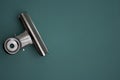 A single clip foldback on a green background Royalty Free Stock Photo