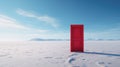 A single closed red door standing on a white desert ground Royalty Free Stock Photo