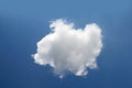 Single cloud isolated over blue sky background Royalty Free Stock Photo