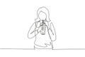 Single continuous line drawing beautiful woman hold plastic cup and drink iced green tea with straw. Make her refreshing in summer