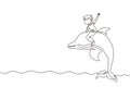Single continuous line drawing little boy riding dolphin. Young kid sitting on back dolphin in swimming pool. Children with Royalty Free Stock Photo