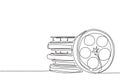 Single continuous line drawing stack of retro old classic cinema video film reels. Vintage movie frame filmstrip item concept one