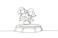 Single continuous line drawing two little girl jumping on trampoline together. Happy kids jumping on round trampoline. Active