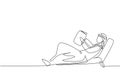 Single continuous line drawing young Arab man reading, learning and laying down on recliner sofa. Literature fans or lovers.