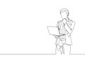 Single continuous line drawing of young business man standing while holding the laptop and thinking business strategy Royalty Free Stock Photo