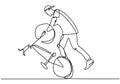 Single continuous line drawing of young cycle rider show freestyle stand on a bicycle. Extreme risky trick. One line draw design