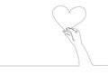 Single continuous line drawing of young happy female hand holding cute heart shaped carton paper. Romantic marriage love concept