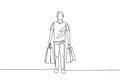 Single continuous line drawing young happy man walking and holding paper bags after buying personal needs at mall. Business