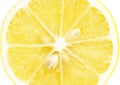 Single cross section of lemon Royalty Free Stock Photo