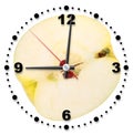 Single cross of yellow apple as a office clock