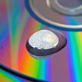 Abstract Crystal on an Iridescent Disc Surface Royalty Free Stock Photo