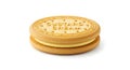 A single custard cream sandwich biscuit with embossed text on white background Royalty Free Stock Photo
