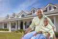 Single Dad and Son In Front of Home Royalty Free Stock Photo