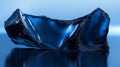 A Single, Dark Blue Obsidian Rock with a Smooth, Shiny Surface Royalty Free Stock Photo
