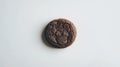Single Dark Chocolate Cookie on White Background Royalty Free Stock Photo