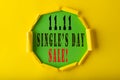 11.11 Single day sales. Yellow circle torn paper with 11.11 Single days sale on Green color background