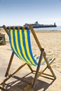 Single deck chair on the beach Royalty Free Stock Photo