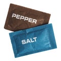 Single dose salt and pepper sachet isolated over white