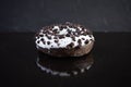 Single doughnut on dark background. Delicious doughnut with chocolate Royalty Free Stock Photo