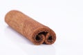 Single dried cinnamon stics on white background Royalty Free Stock Photo