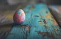 A Single Easter Egg on Rustic Wooden Surface Royalty Free Stock Photo