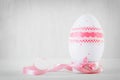 Single easter egg on wooden table. Decoupage art Royalty Free Stock Photo