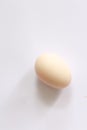 Single egg at white background Royalty Free Stock Photo