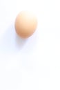 Single egg at white background Royalty Free Stock Photo