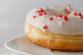 Single elegant donuts on plate