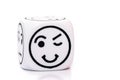 Single emoticon dice with blinking expression sketch