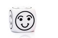 Single emoticon dice with happy expression sketch