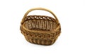 Single empty brown wicker basket with handle isolated on white background, top view. Detail basketry handcraft Royalty Free Stock Photo