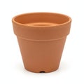 Single empty unglazed clay flower pot with drainage hole isolated on white studio background Royalty Free Stock Photo