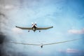 A single engine plane towing a sailplane Royalty Free Stock Photo