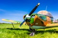 Delta, BC - May 7, 2019: Single engine propeller plane with camoflage style paint stored at Delta Heritage Airpark. Royalty Free Stock Photo