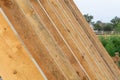 Wooden rafters against the blue sky at sunset Royalty Free Stock Photo