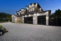 Single-family home featuring a brick driveway leading up to the front entrance Royalty Free Stock Photo