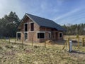 A single-family house built of ceramic blocks with a tile roof in a shell state Royalty Free Stock Photo